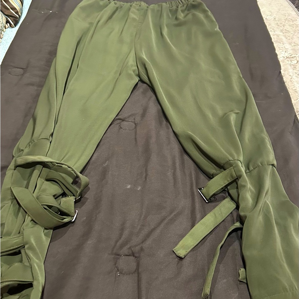 Army green pants buckle on the bottom